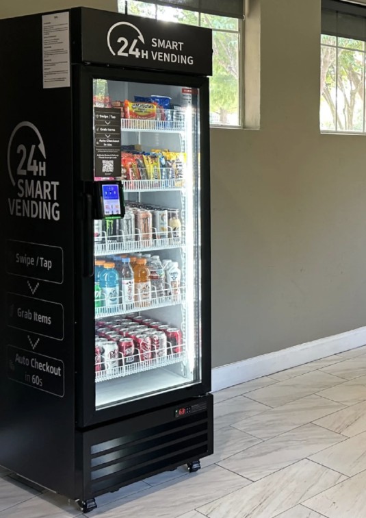 Smart vending cooler installed in a tiled common area